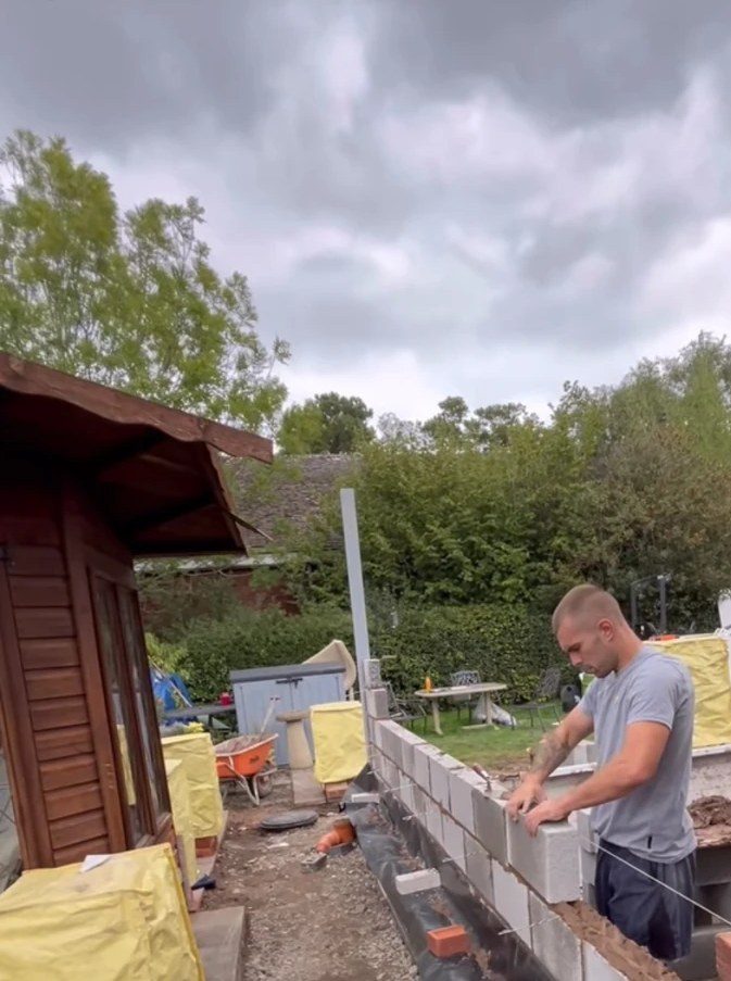 Vincent laying blockwork on site